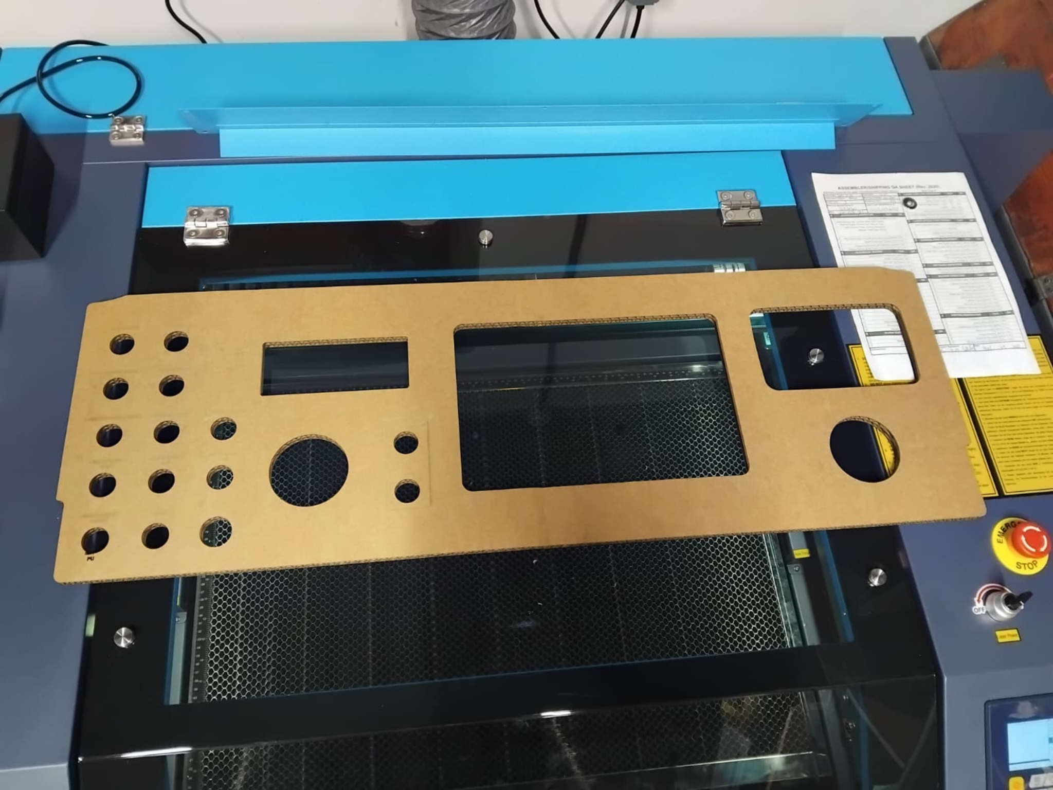 Laser-cut marine panel component during fabrication