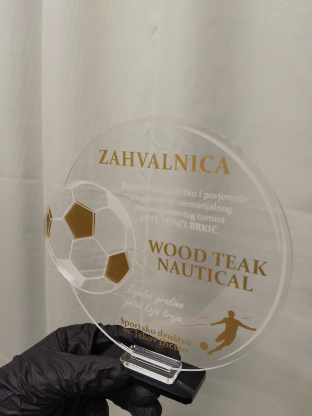 Close-up of custom acrylic sports award