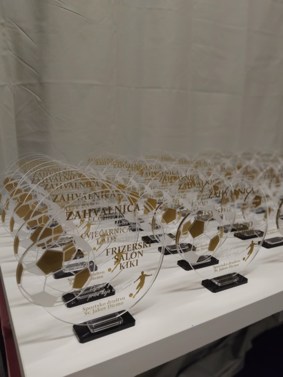 Group of custom acrylic sports awards