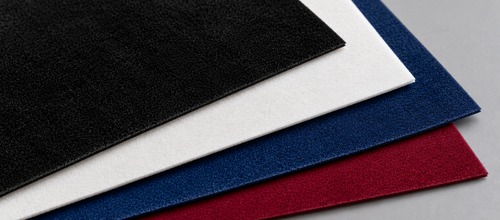 Flock textile application with raised soft texture